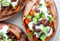 Black Bean–Stuffed Sweet Potatoes with Cilantro Lime Yogurt