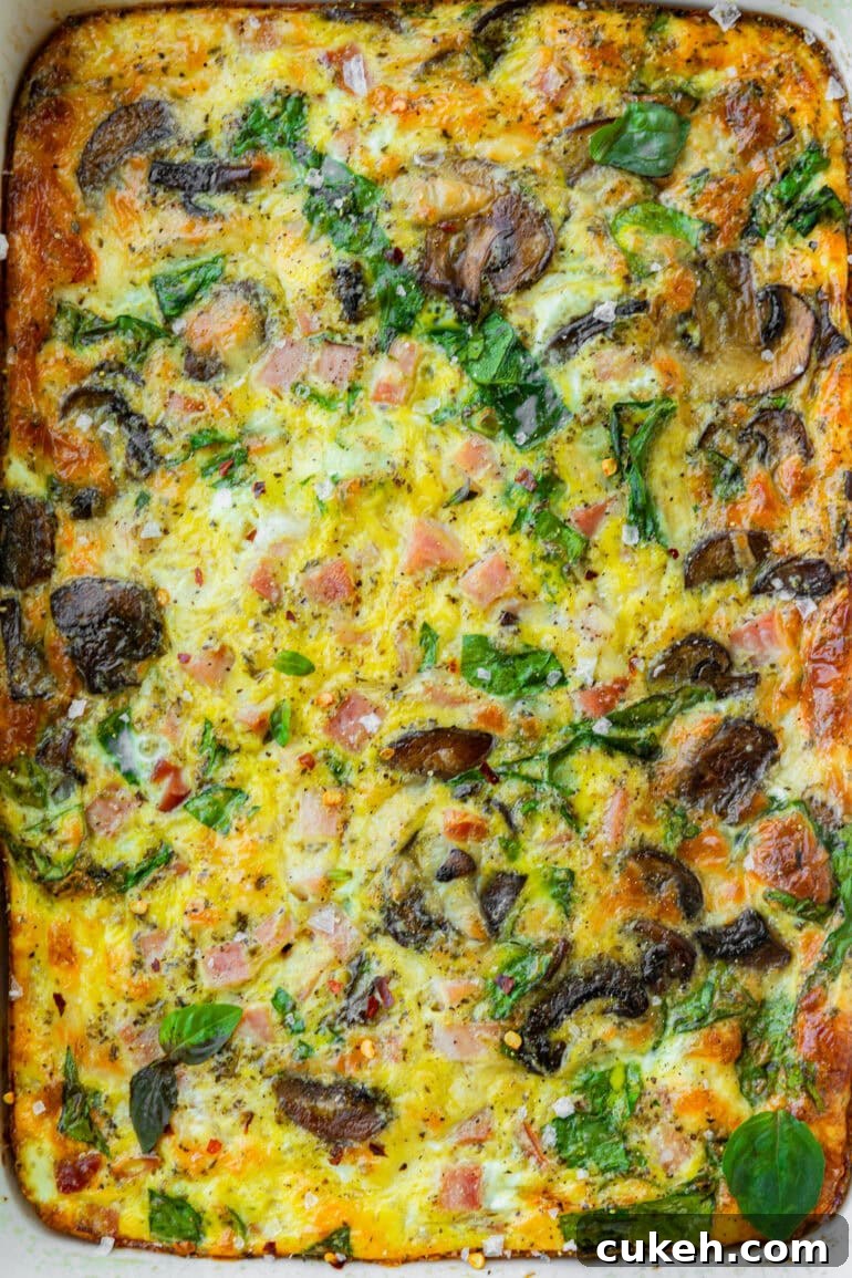 a baked ham, egg, cheese and sauteed mushroom breakfast casserole