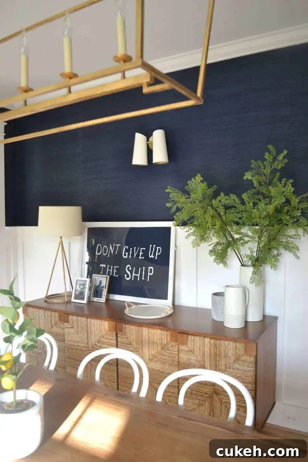 sideboard in a navy dining room