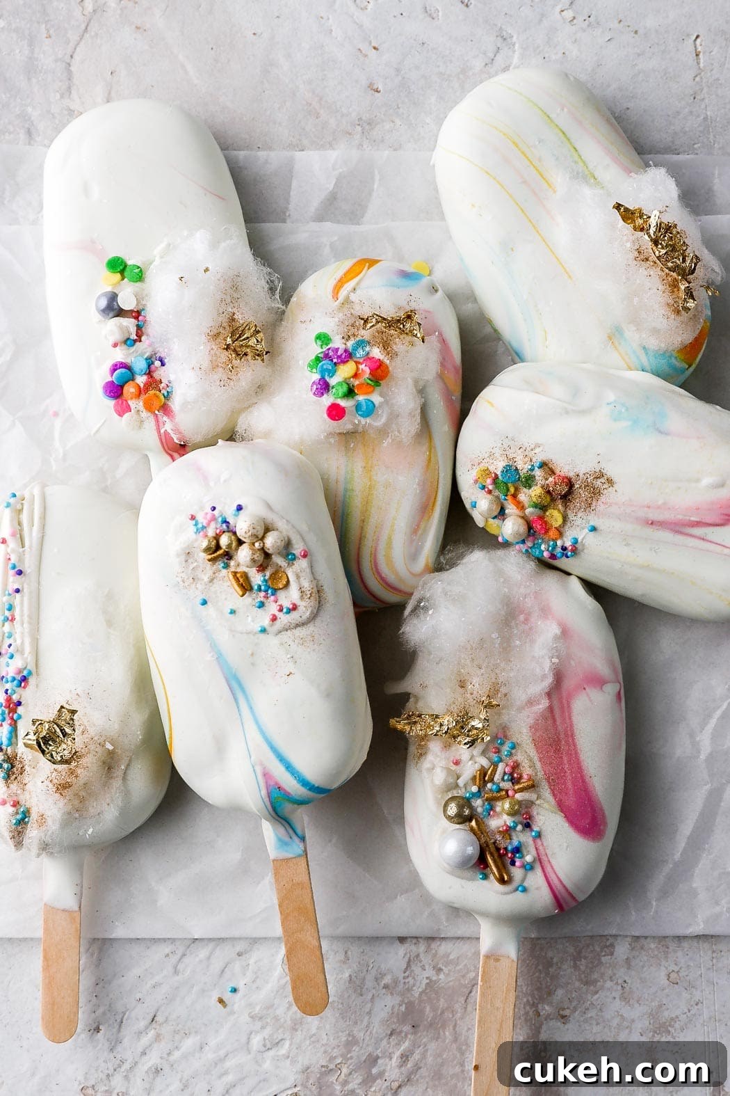 7 cakesicles with sprinkles