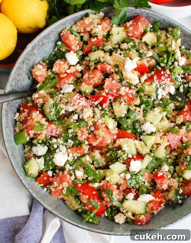 Tomato Cucumber Feta Quinoa Salad in large bowl