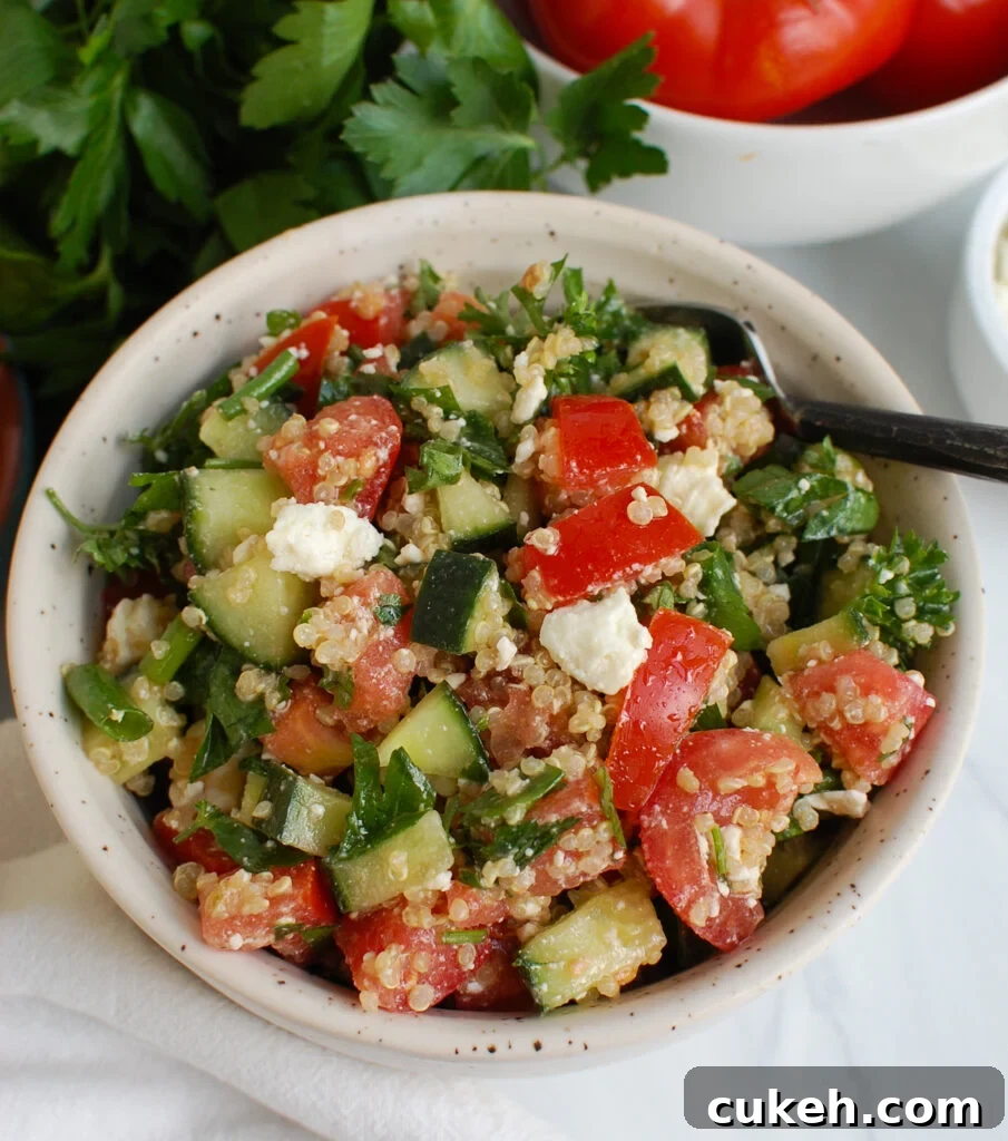Tomato Cucumber Feta Quinoa Salad in small bowl
