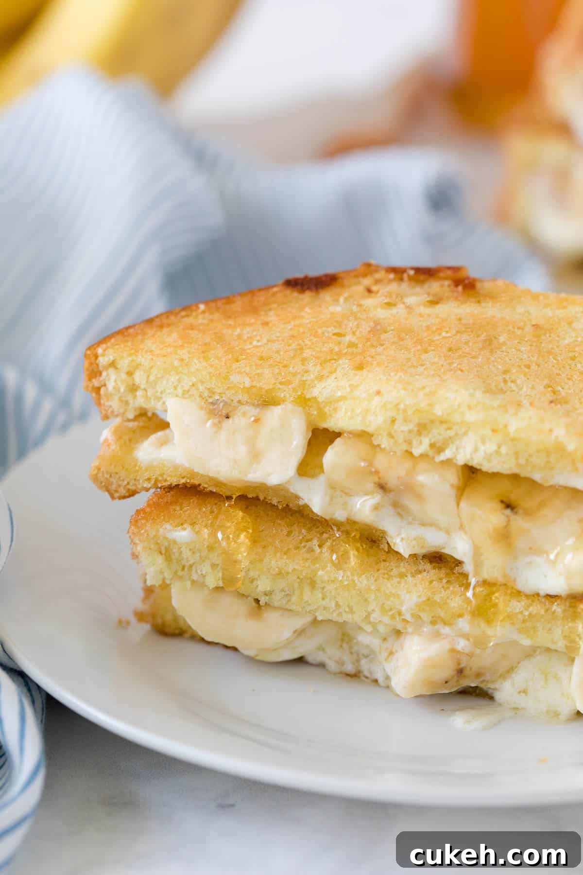 Honey banana grilled cheese on a plate.