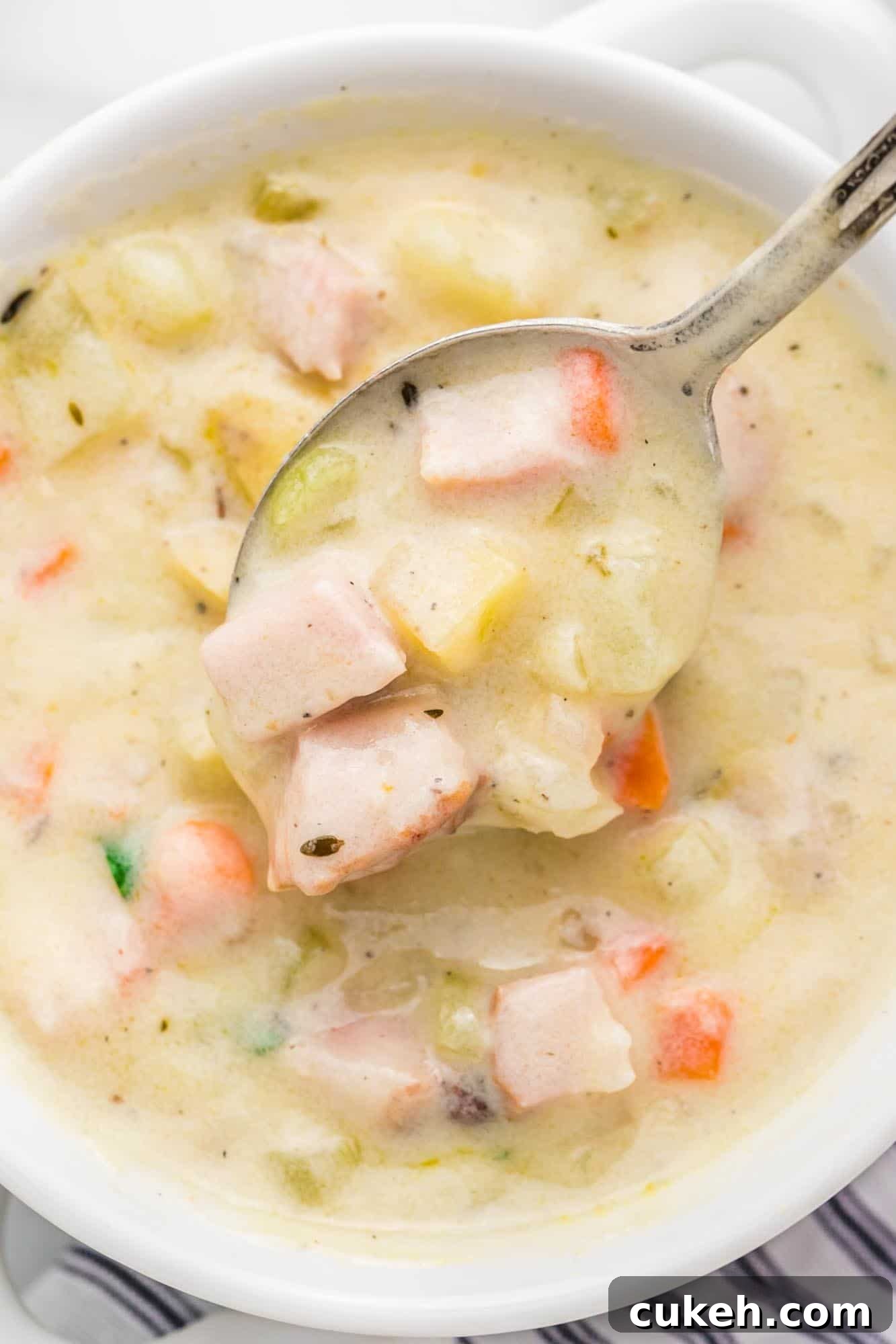 64 Tasty Leftover Ham Recipes for Every Meal 4 Top down view of a bowl of ham and potato soup