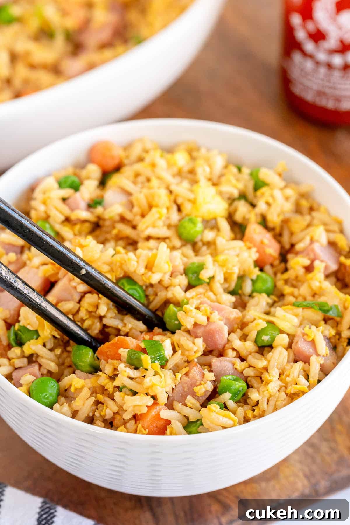 64 Tasty Leftover Ham Recipes for Every Meal 8 Bowl of fried rice mixed with chopped vegetables and ham.