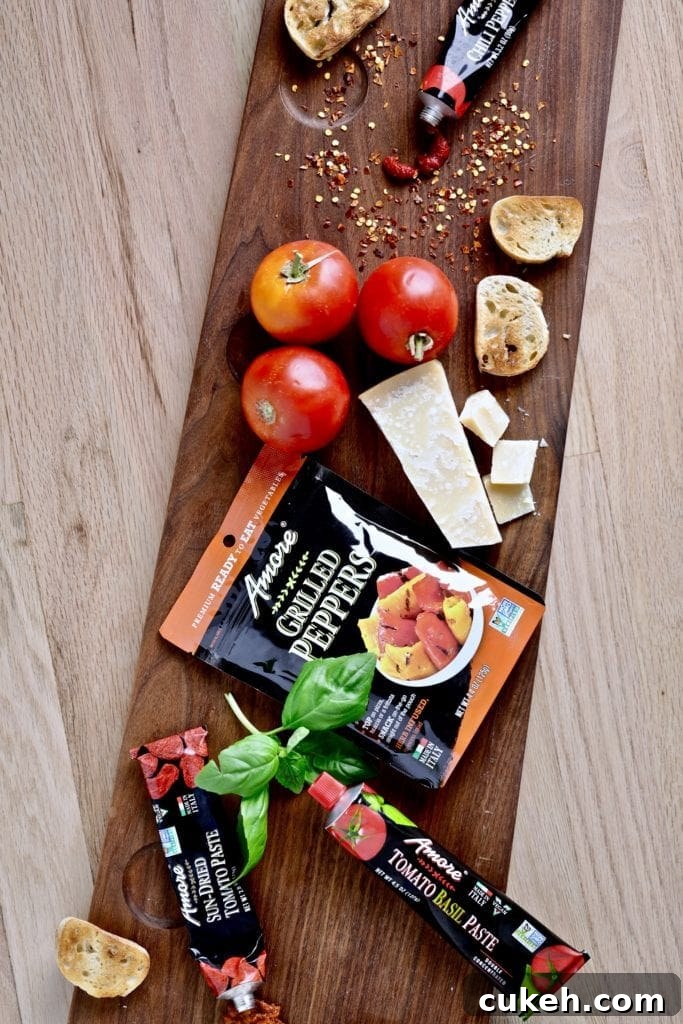 Gnocchi in creamy red pepper sauce ingredients including tomato paste, tomatoes, and cheese.