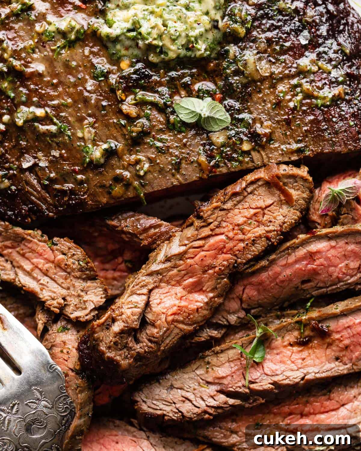 An up close image of cast iron flank steaks.