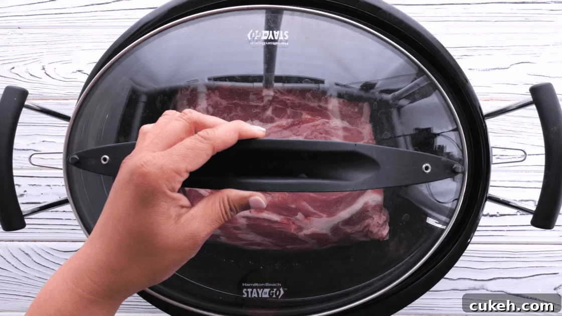 Cover and cook slow cooker.