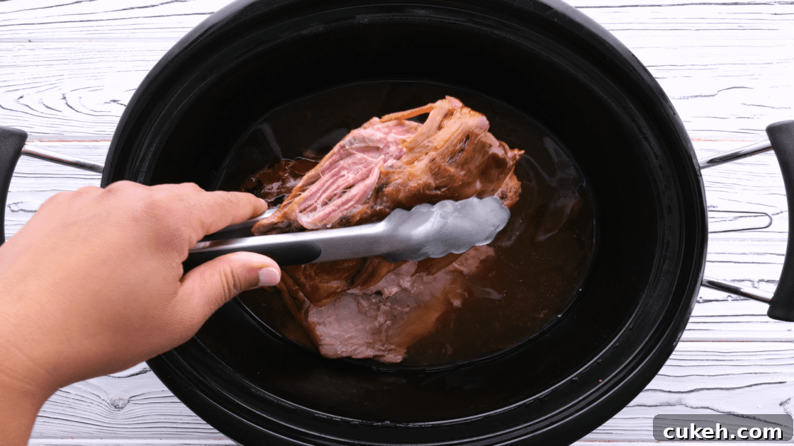 Remove and shred pork roast.