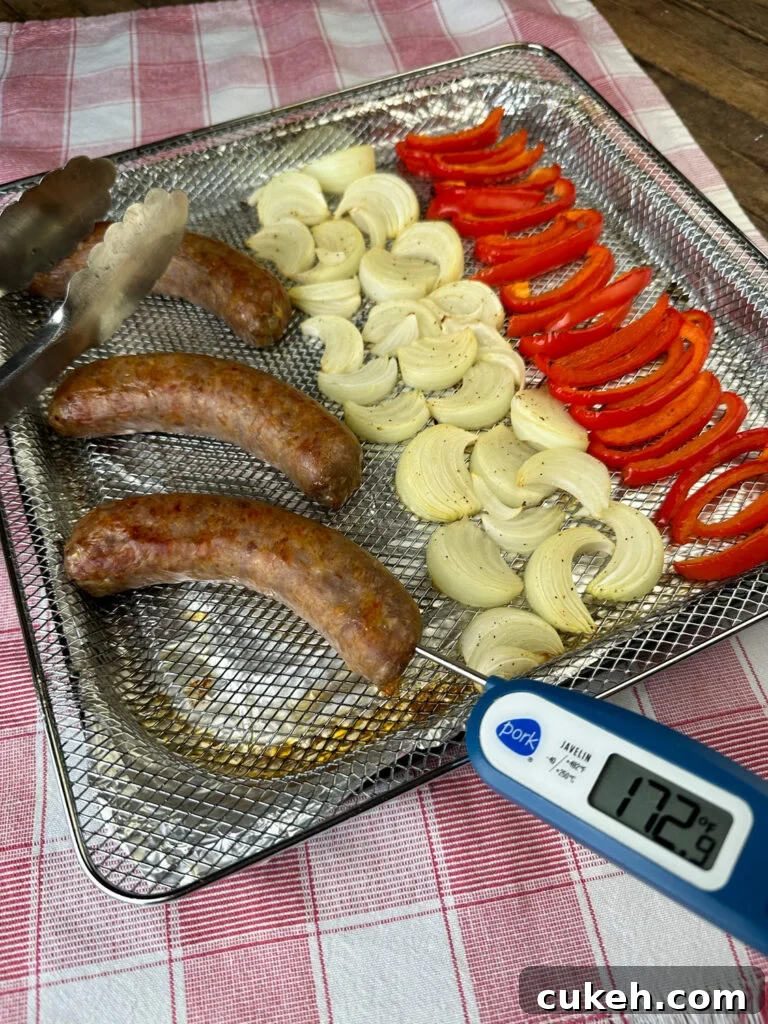 Sweet Italian sausage cooked to internal temp of 160 degrees F in air fryer basket