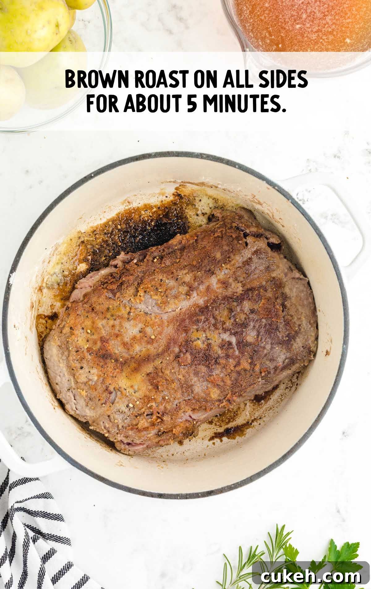 roast being browned in a pot