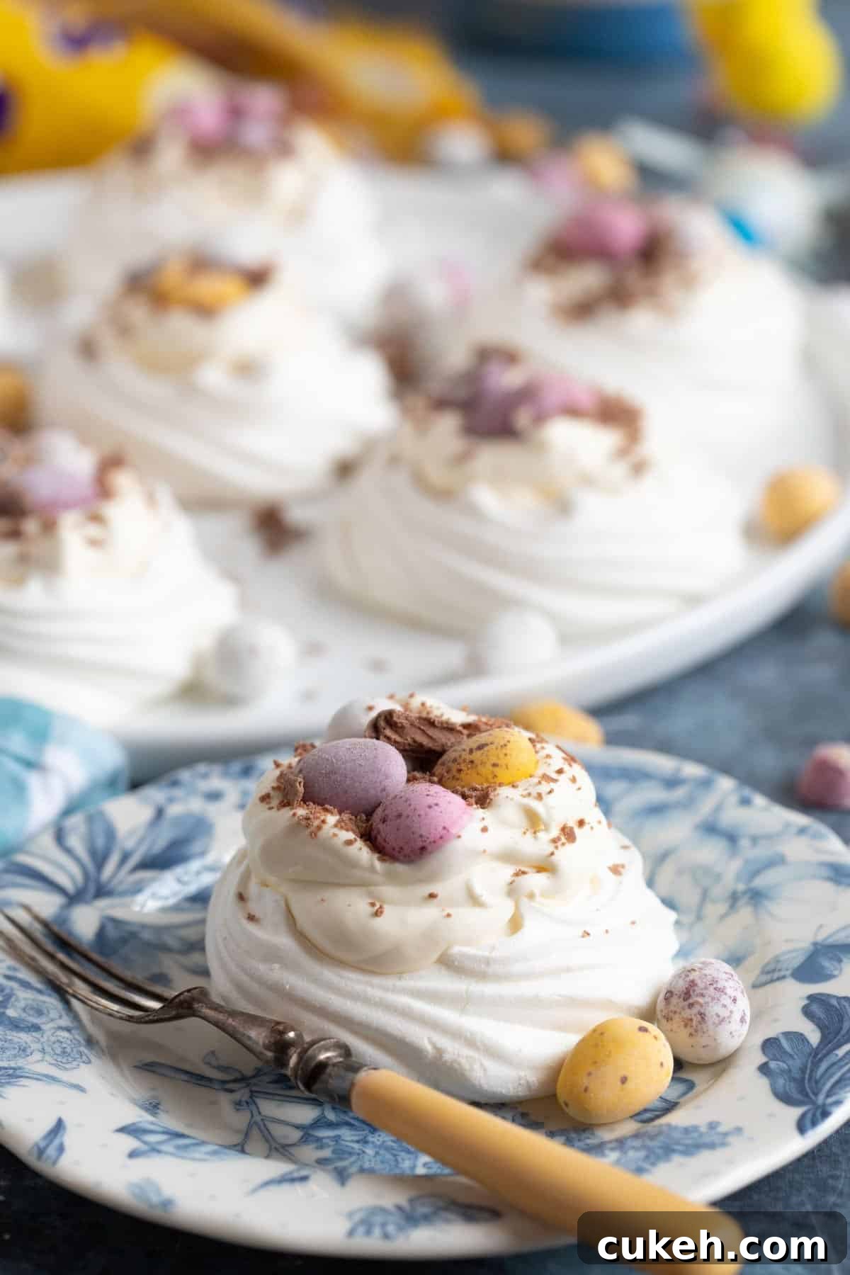 Mini Egg meringues on plates.