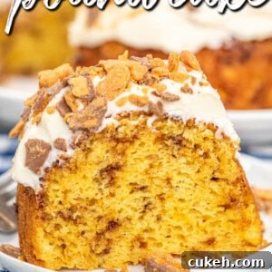 slice of butterfinger cake on a plate with text overlay
