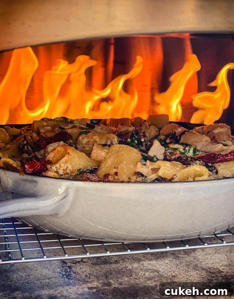 easy chicken pasta bake in a pizza oven