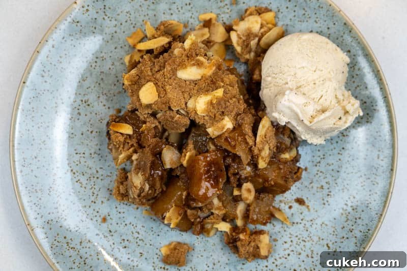 Serving the apple crisp with ice cream