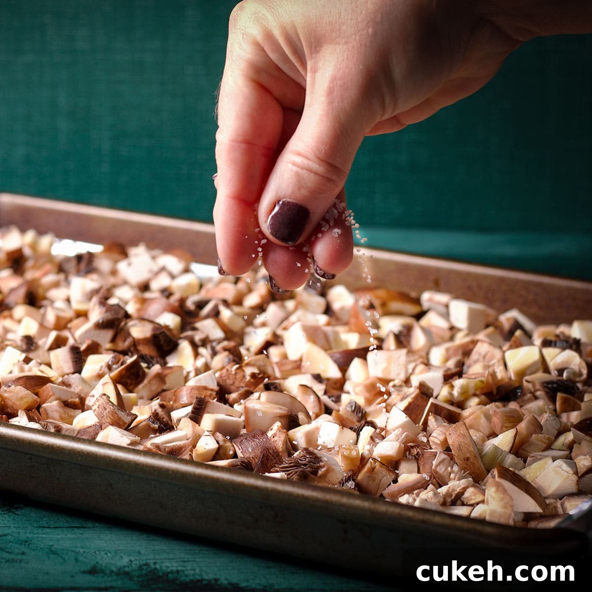 Sprinkle salt over the mushrooms before roasting.