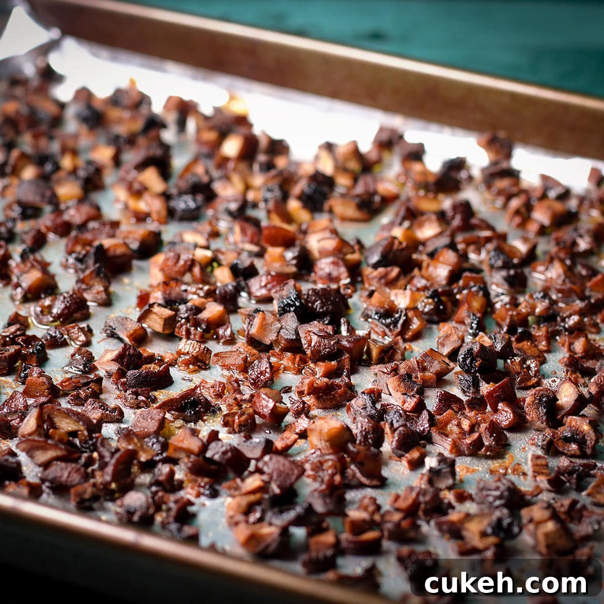 Chopped mushrooms that have been roasted in the oven until they are brown and carmalized.