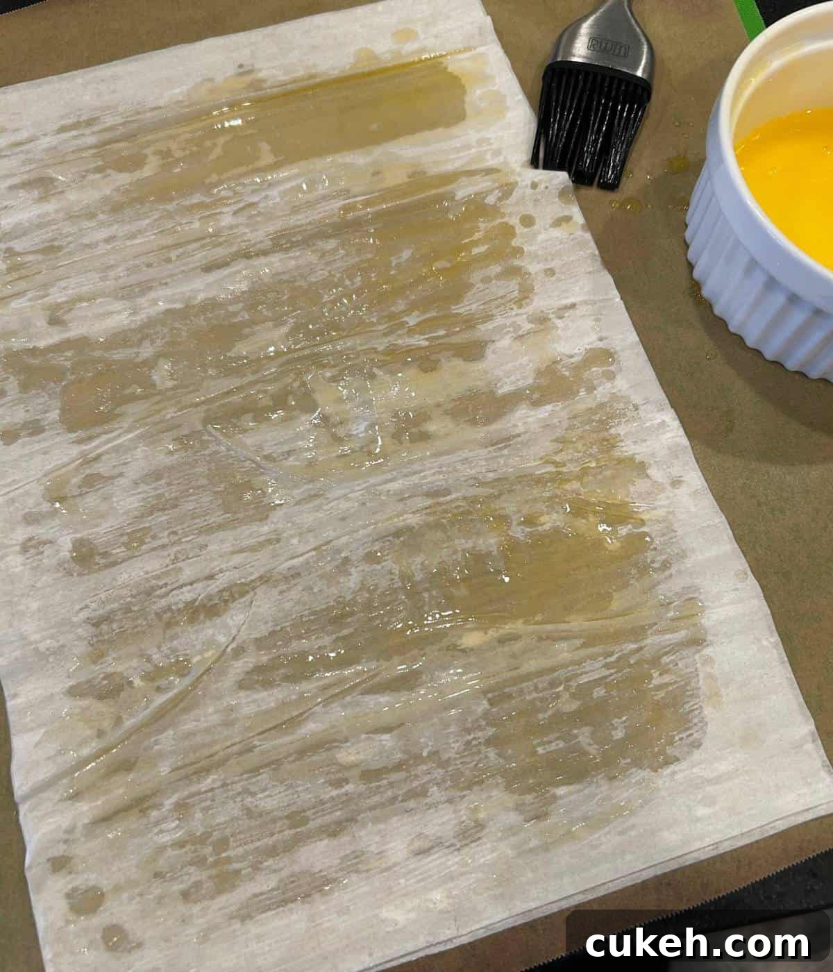 Layers of phyllo dough with butter in between.