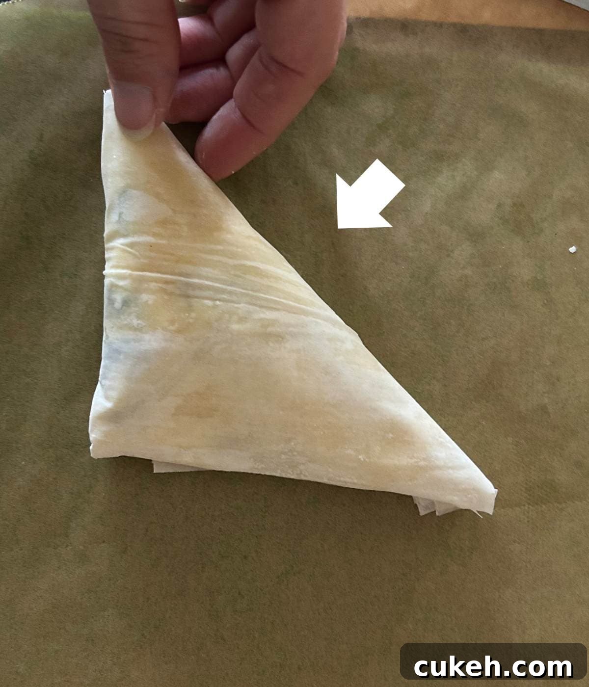 Folding phyllo dough.