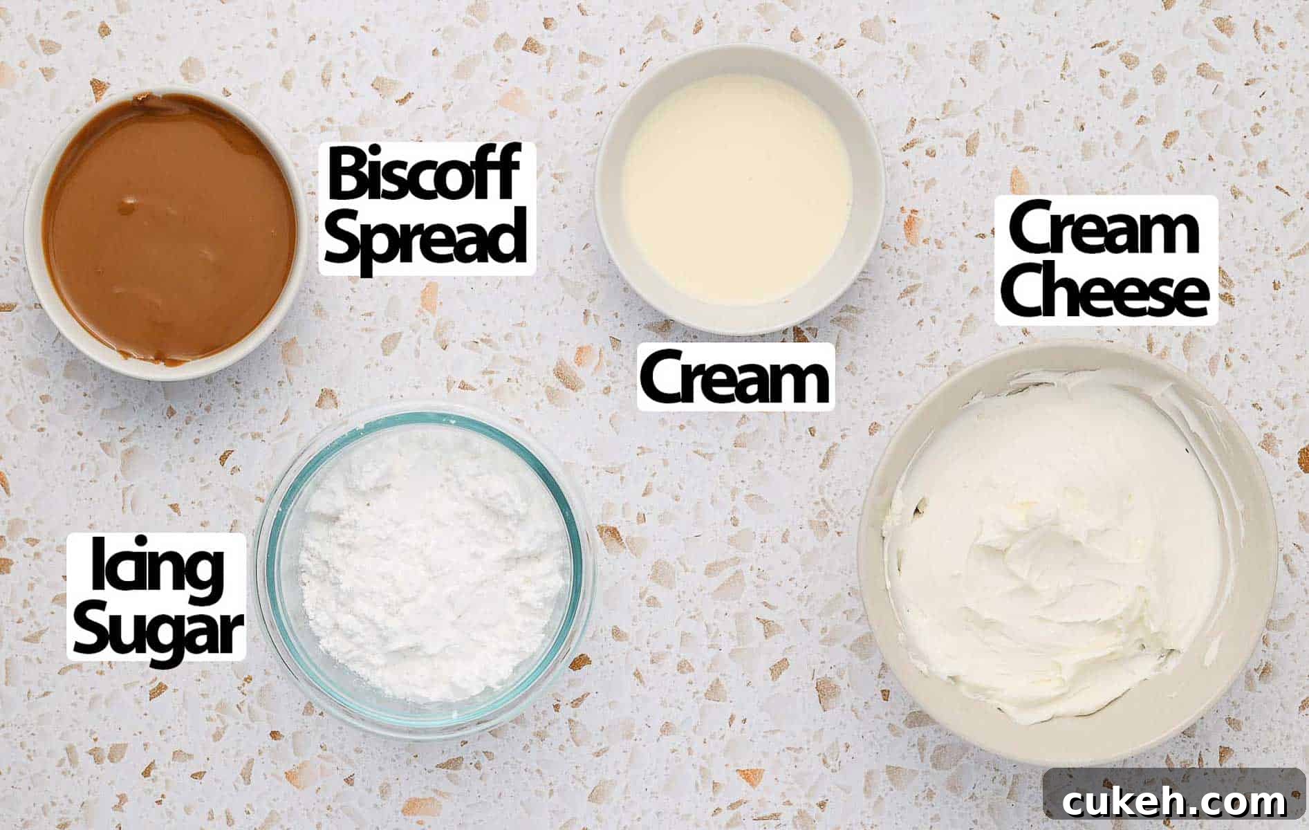 Ingredients on a light speckled surface.