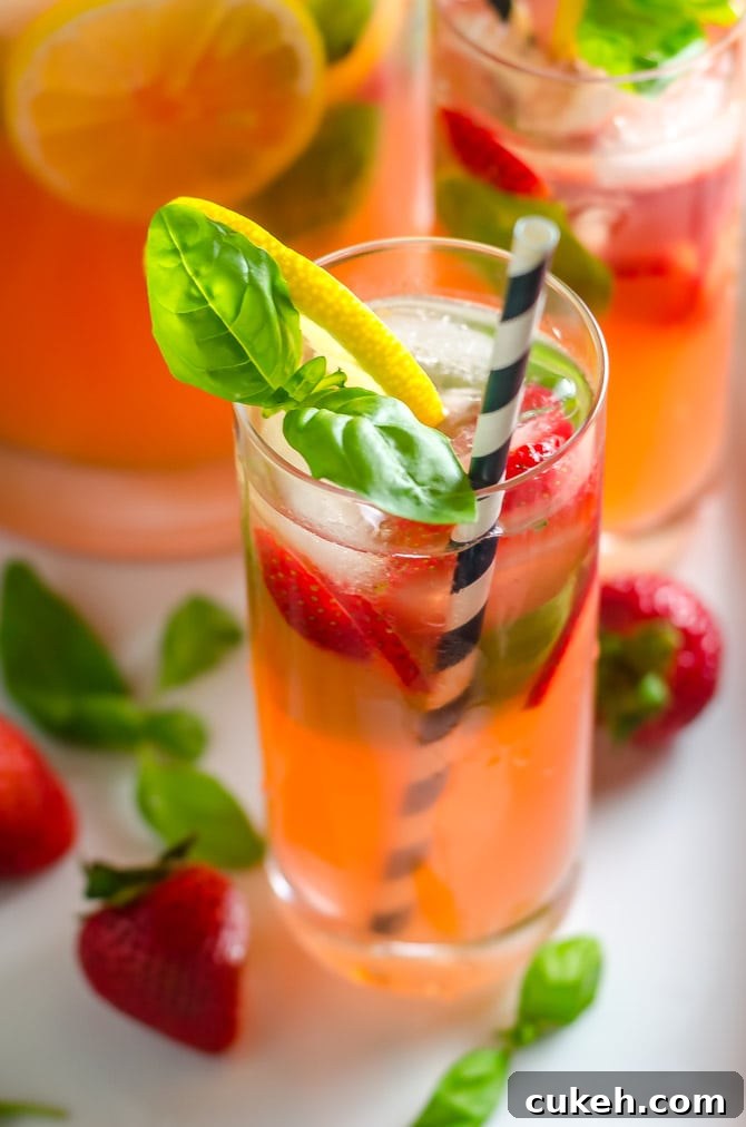 Strawberry Basil Vodka Lemonade Recipe for Summer Cocktails 4 Strawberry Basil Spiked Lemonade. This vodka-spiked cocktail is fruity, refreshing, and perfect for summer. | hostthetoast.com