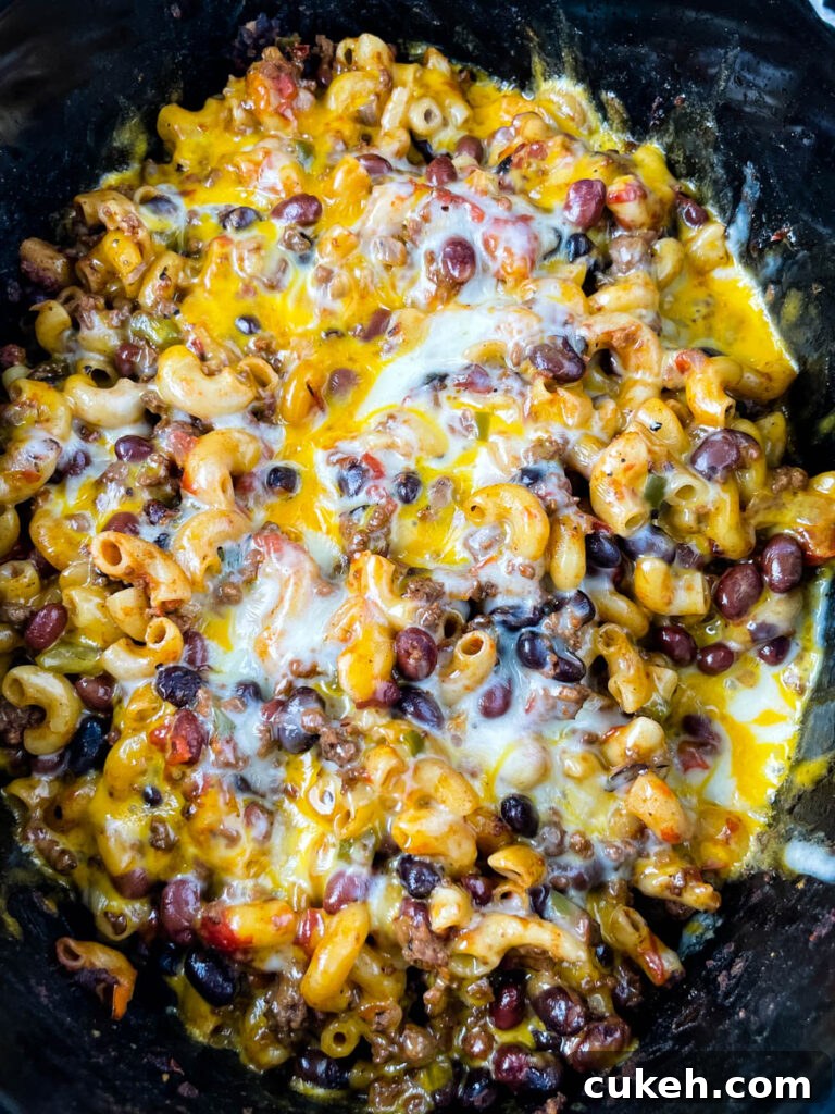 chili mac and cheese in a Crockpot slow cooker