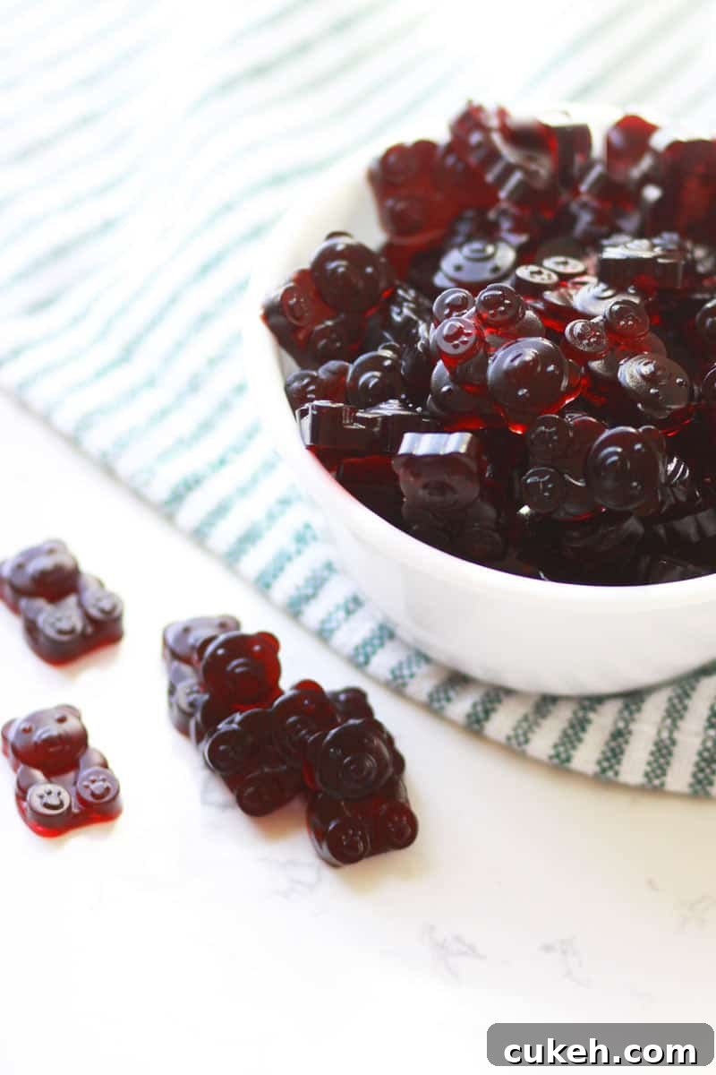 a bowl of dark red tart cherry gummies