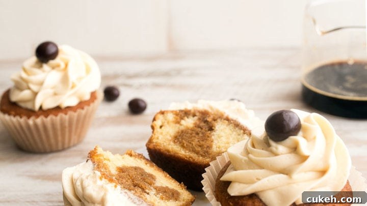 Tiramisu Cupcakes for Two, small batch style. Recipe makes 4 cupcakes. Vanilla cupcakes with espresso-Kahlua soak and mascarpone frosting.