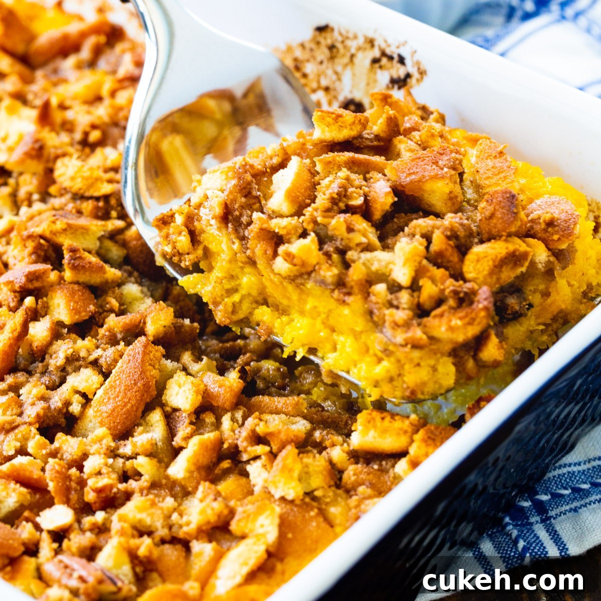 Spatula scooping up Butternut Squash Casserole