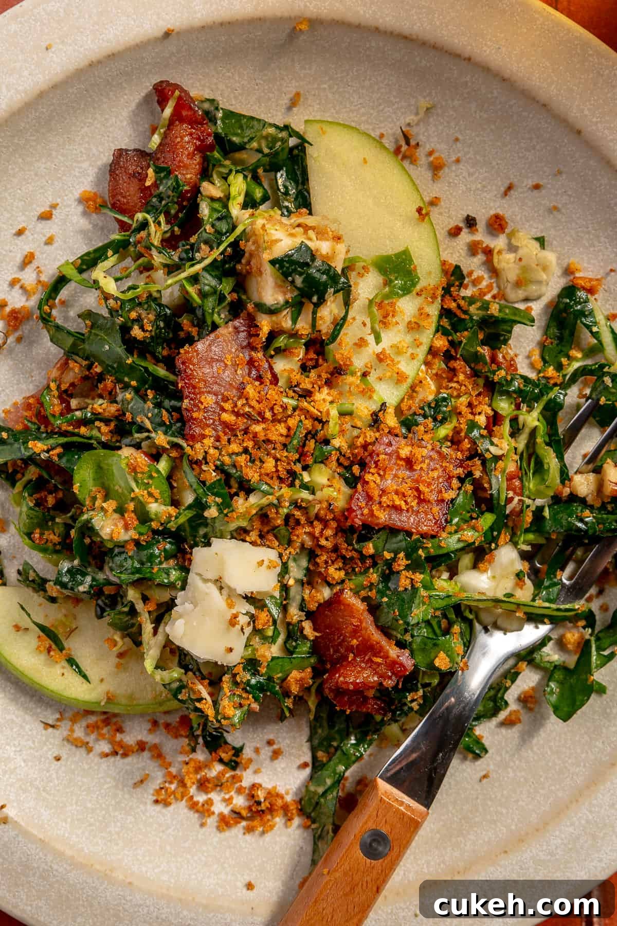 Bacon Brussels Crunch Salad platted on bowl.