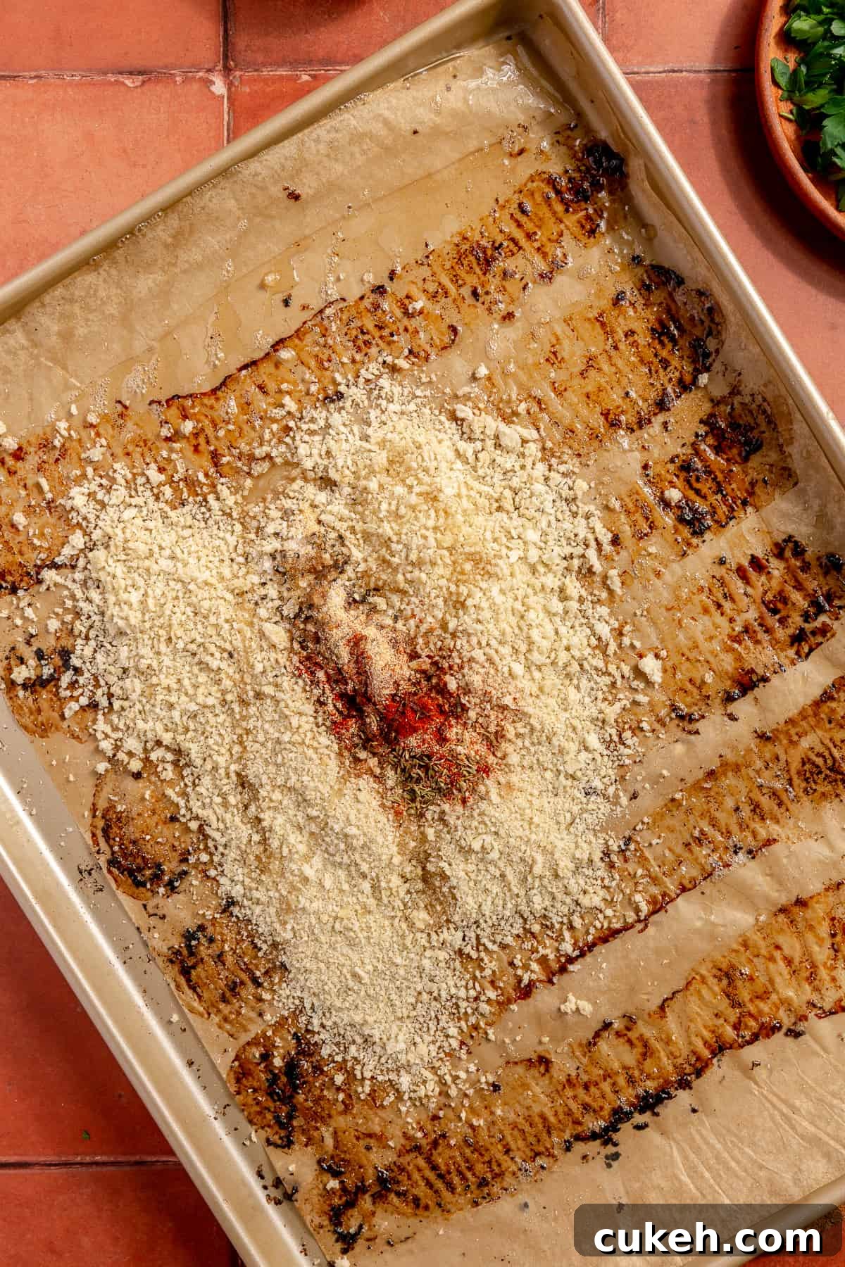 Panko and seasonings on same sheet pan used to cook bacon.