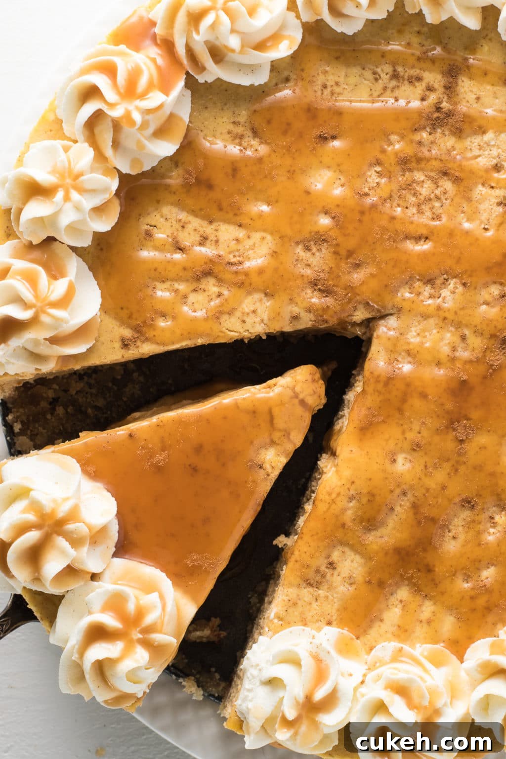 Low-Carb Pumpkin Cheesecake Recipe for Your Holiday Table 13 Slice of pumpkin cheesecake on plate