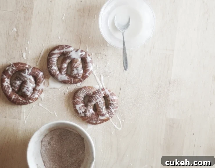 Cinnamon Sugar Soft Pretzels: Fluffy Homemade Recipe 6 Glazed soft pretzels and bowl of cinnamon sugar
