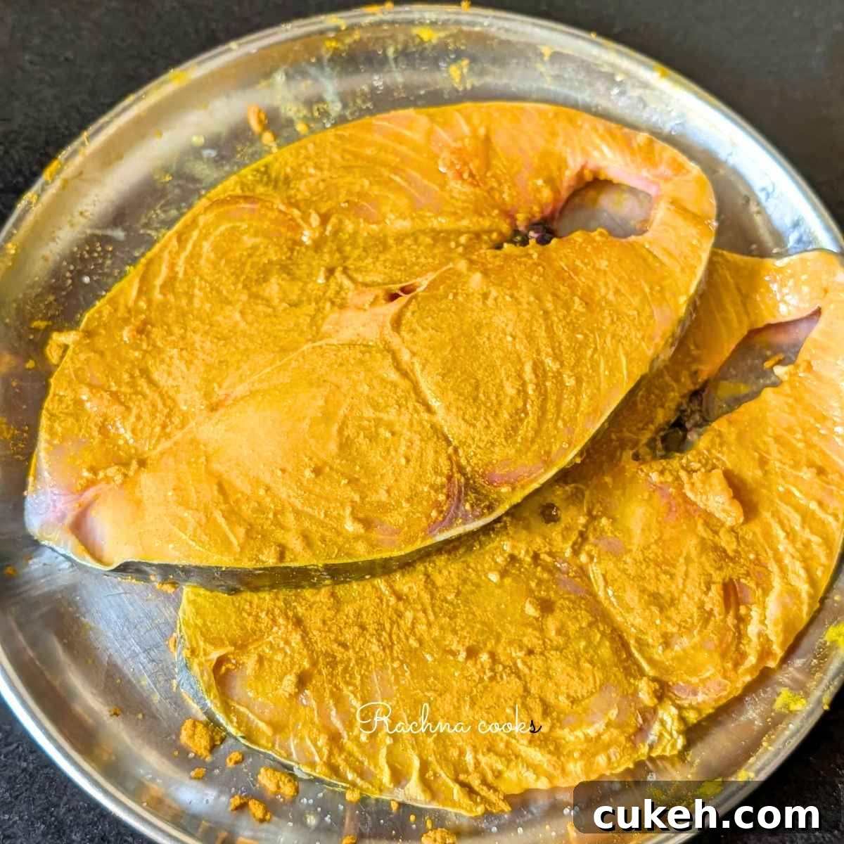 Surmai fillets marinated with turmeric powder, lime juice and salt