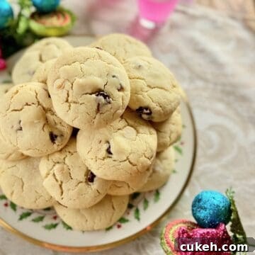 Cookies stacked on decorative plate.