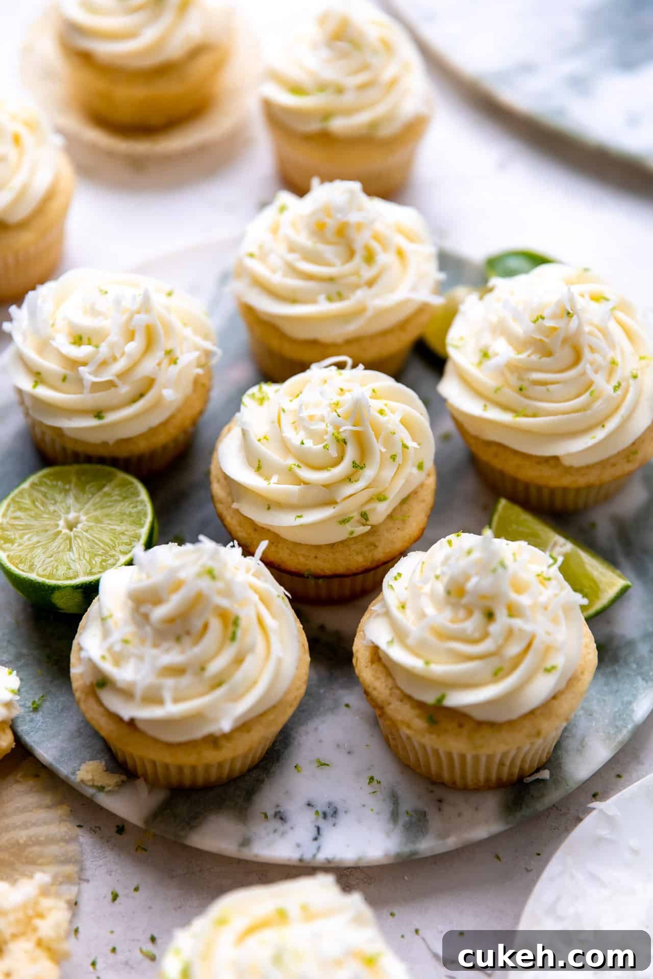 Tray filled with coconut lime cupcakes.