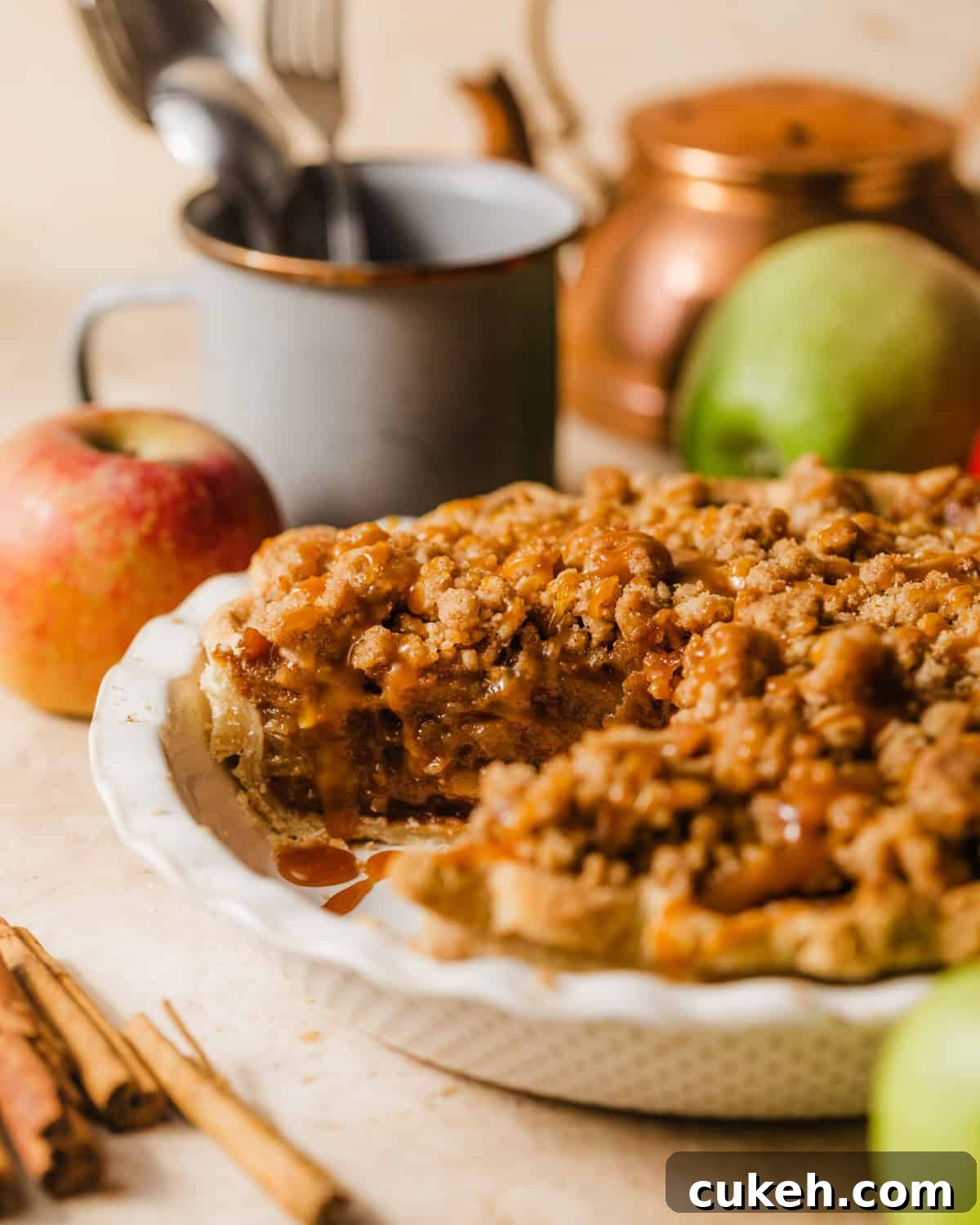 salted caramel dutch apple pie in a pie dish.