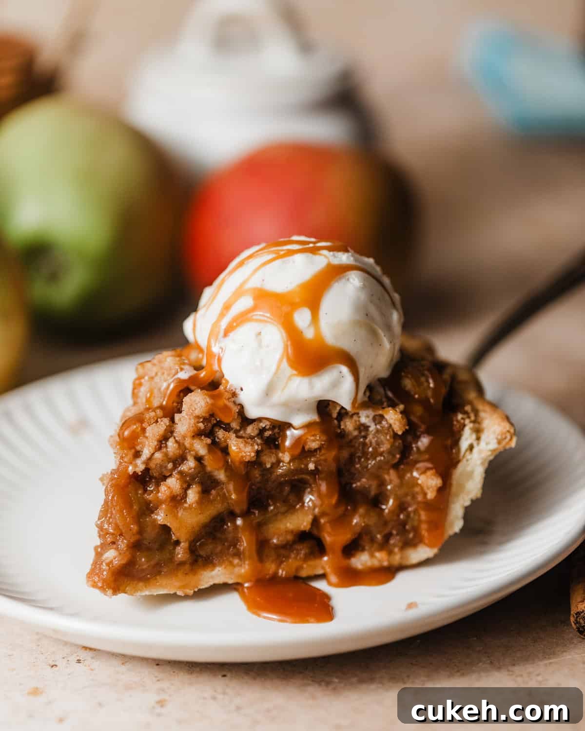 up close photo of a slice of dutch apple pie.