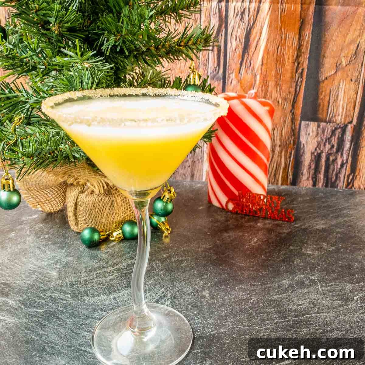 Snowball cocktail with bitter lemon and raw sugar rim.