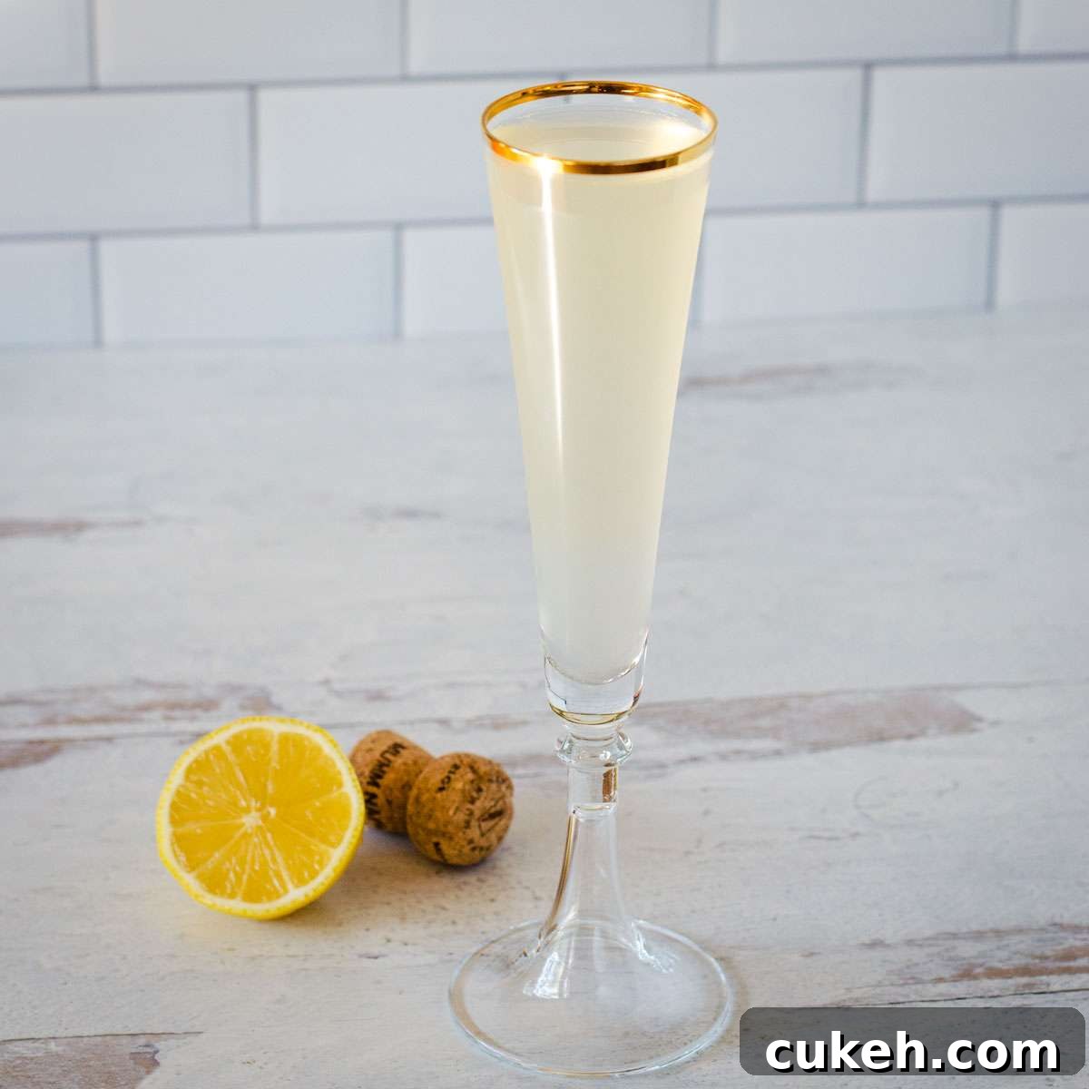 French 76 cocktail with lemon and champagne.