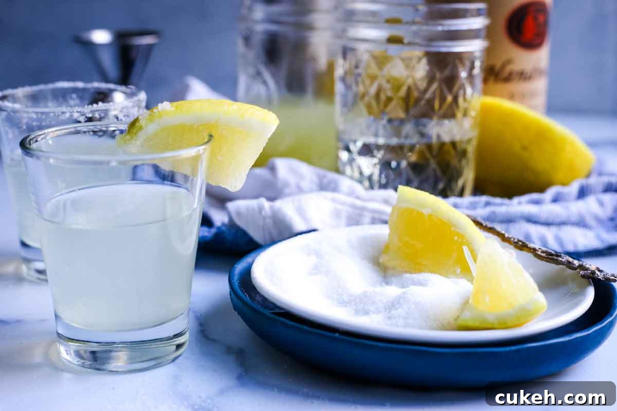 Lemon drop shots on a serving tray.