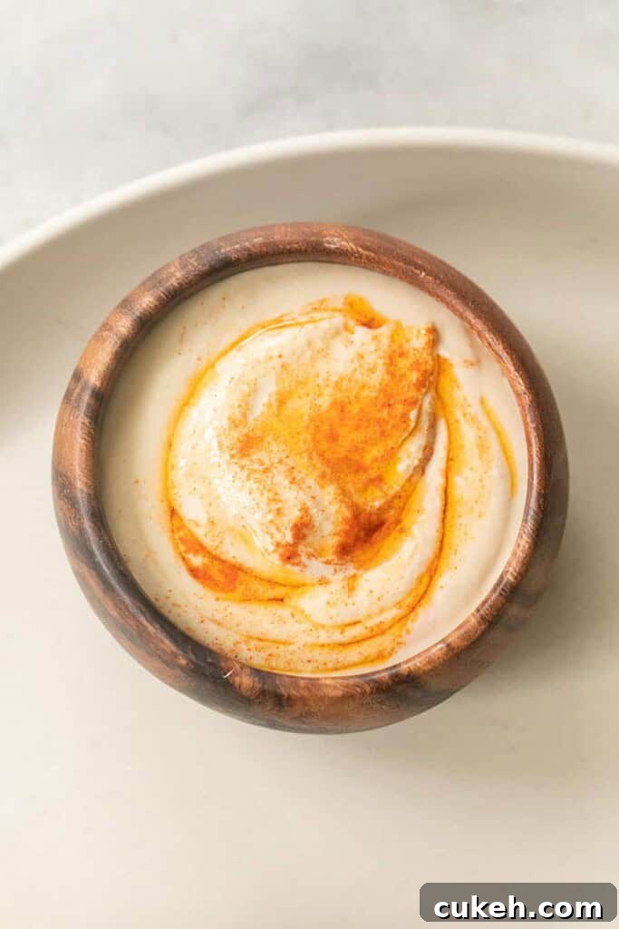 Authentic Greek Mezze Platter: Meze Recipes & Serving Guide 4 Hummus dip on a platter.