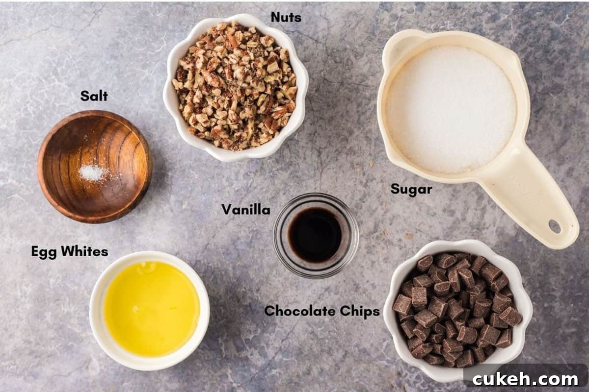 Overnight cookies recipe. Egg whites, sugar, and other ingredients for chocolate chip meringue cookies.