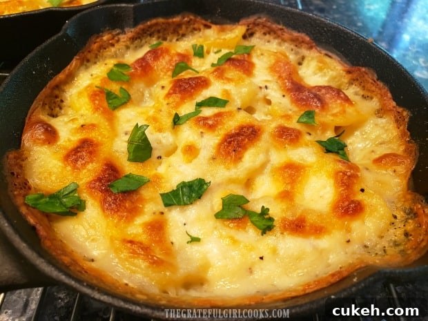 Scalloped Potatoes for Two are golden brown and bubbly once done baking. Scalloped Potatoes for Two are golden brown and bubbly once done baking.