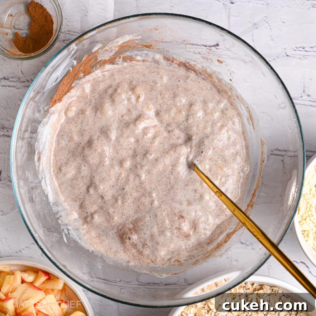Stirring wet ingredients until smooth