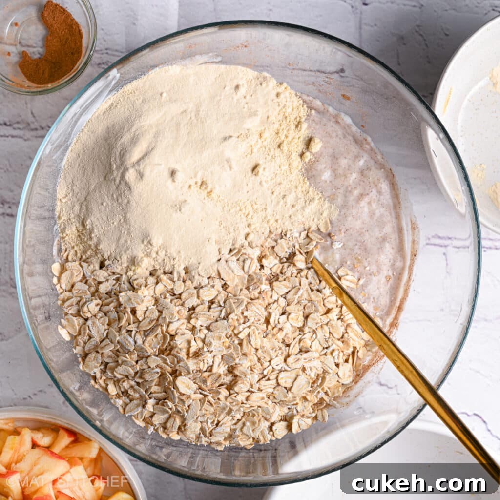 Adding rolled oats and oat flour to wet mixture