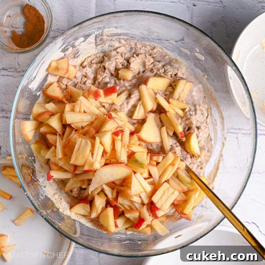 Adding diced apple to dough