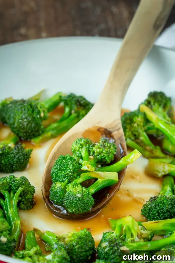 Easy stir fried broccoli in an Asian sauce.