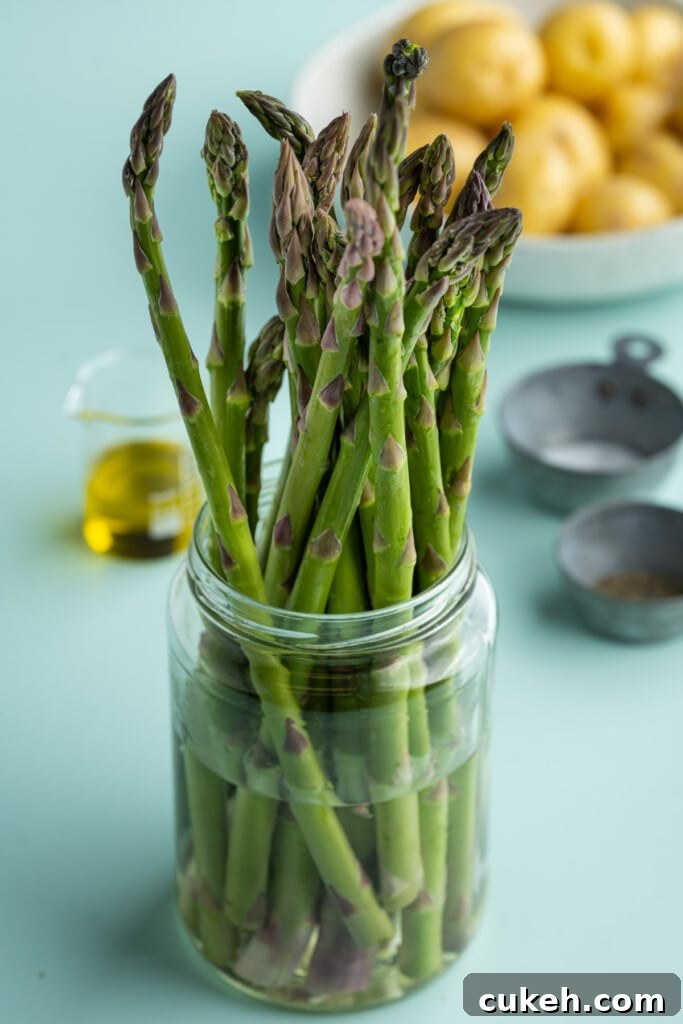Storing asparagus before roasting with potatoes.