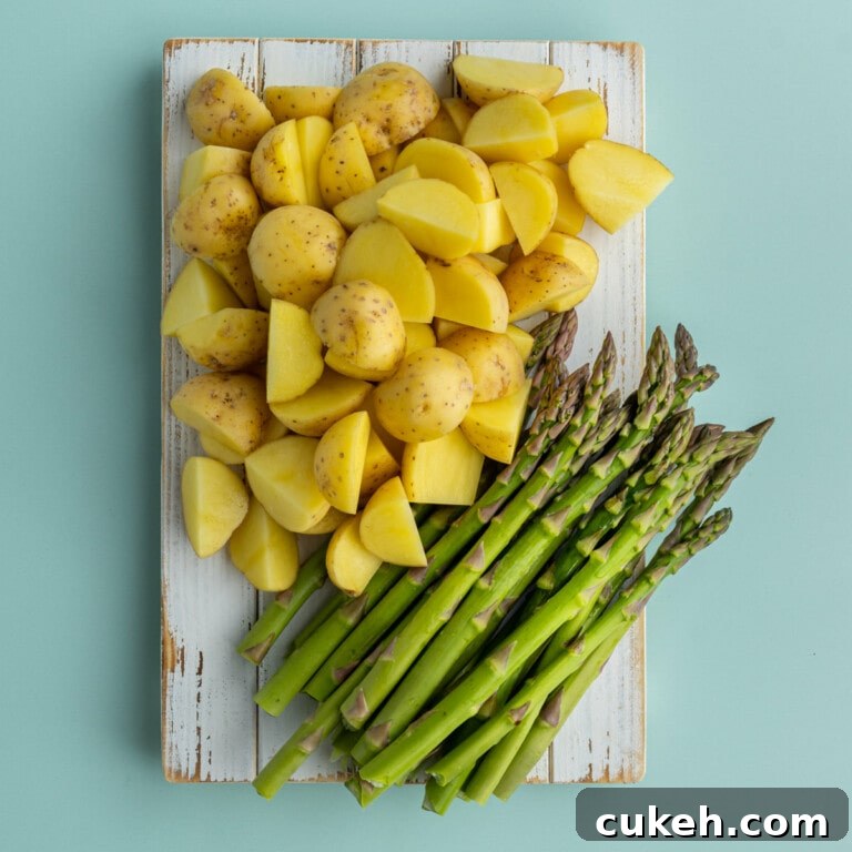 Prepped potatoes and asparagus